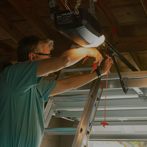 MAN FIXING GARAGE